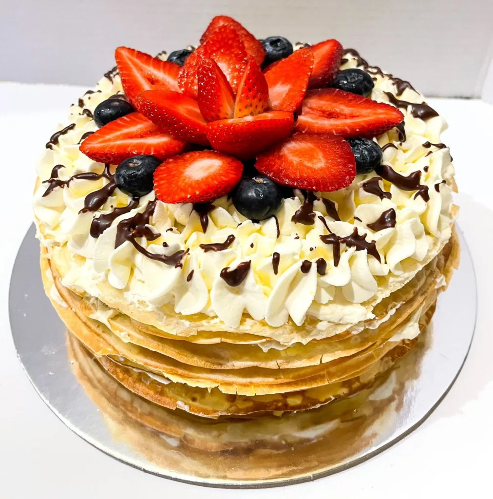 8” Strawberries & Cream Crepe cake …$90